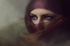 Jonge Arabische vrouw in hijab met sexy blauwe ogen Royalty-vrije Stock Fotografie Jonge Arabische vrouw in hijab met sexy blauwe ogen Royalty-vrije Stock Fotografie