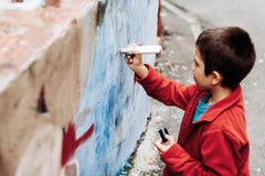 Jonge graffitikunstenaar stock fotografie Jonge graffitikunstenaar stock fotografie