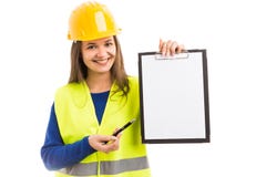 Jonge vrouwenarchitect die leeg klembord houden stock afbeeldingen Jonge vrouwenarchitect die leeg klembord houden stock afbeeldingen