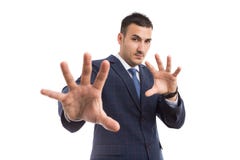 Jonge zakenman of verkoopmens met het verdedigings gesturing Stock Afbeelding Jonge zakenman of verkoopmens met het verdedigings gesturing Stock Afbeelding