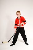 Jongen in hockeyhouding royalty-vrije stock foto Jongen in hockeyhouding royalty-vrije stock foto