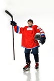 Joueur de hockey de gar?on en silhouette de studio d'isolement sur le fond blanc photos stock Joueur de hockey de gar?on en silhouette de studio d'isolement sur le fond blanc photos stock