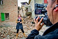 Journaliste de TV photo stock Journaliste de TV photo stock