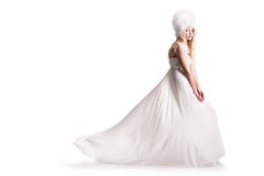 A jovem mulher bonita em um vestido de casamento Imagem de Stock Royalty Free A jovem mulher bonita em um vestido de casamento Imagem de Stock Royalty Free