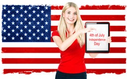 Jovem mulher com a bandeira nacional americana Fotografia de Stock