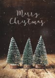 Joyeux Noël avec l'arbre et la neige de Noël tombant sur le bois grunge t photographie stock Joyeux Noël avec l'arbre et la neige de Noël tombant sur le bois grunge t photographie stock