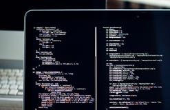 Js code on laptop screen, web development. Web development, writing js code, office, laptop stock image