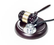 Judge hammer and stethoscope on a white background royalty free stock photos Judge hammer and stethoscope on a white background royalty free stock photos