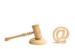 Judge`s hammer and email address. The concept of legal proceedings for the seizure of rights to use the names of mail and website stock image Judge`s hammer and email address. The concept of legal proceedings for the seizure of rights to use the names of mail and website stock image
