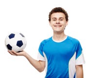 Jugador de fútbol del adolescente que celebra la bola foto de archivo libre de regalías Jugador de fútbol del adolescente que celebra la bola foto de archivo libre de regalías