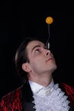 The juggler have a balanse ball on the spoon royalty free stock images The juggler have a balanse ball on the spoon royalty free stock images