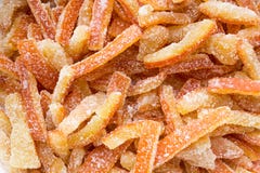 Juicy and delicate candied fruit cooked from orange peel, and lopped in sugar. Royalty Free Stock Images Juicy and delicate candied fruit cooked from orange peel, and lopped in sugar. Royalty Free Stock Images