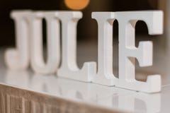 JULIE Name ha fatto di grandi blocchi bianchi immagine stock libera da diritti JULIE Name ha fatto di grandi blocchi bianchi immagine stock libera da diritti