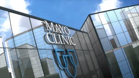 Editorial, Mayo Clinic logo on glass building.