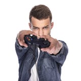 Junger Mann, der auf Konsole oder Computer spielt stockfotos Junger Mann, der auf Konsole oder Computer spielt stockfotos