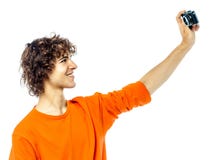 Junger Mann, der die Kamera fotografiert Porträt hält Stockbilder Junger Mann, der die Kamera fotografiert Porträt hält Stockbilder