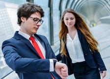Junior executives of company are late for a business meeting royalty free stock photos Junior executives of company are late for a business meeting royalty free stock photos