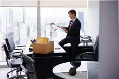 Just Hired Executive Business Man Moves To New Office royalty free stock photo Just Hired Executive Business Man Moves To New Office royalty free stock photo