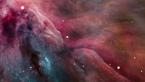 4K 3D Spaceship flies around the Orion nebula. Flight Through Space diffuse nebula and clusters of stars in the Milky Way galaxy.