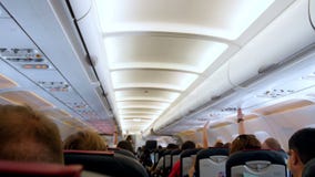 4k out of focus video of long row of passenger seat in airplane before take off stock video footage 4k out of focus video of long row of passenger seat in airplane before take off stock video footage