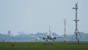Twin engine widebody airplane take off in the morning stock footage Twin engine widebody airplane take off in the morning stock footage