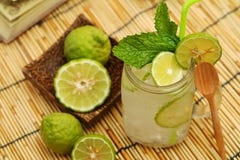 Kaffir lime So, Bergamot soda Cool drink, Thailand tradition Herb for Treatment of Acid Reflux, with Oriental Earth tone map backg stock image Kaffir lime So, Bergamot soda Cool drink, Thailand tradition Herb for Treatment of Acid Reflux, with Oriental Earth tone map backg stock image