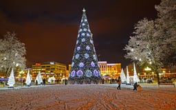 KALININGRAD, RUSSIA. New Year`s illumination and fir-tree in the winter evening. Victory Square stock photo KALININGRAD, RUSSIA. New Year`s illumination and fir-tree in the winter evening. Victory Square stock photo
