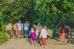 KANCHANABURI,THAILAND-DECEMBER 10 : Unidentified tourists in Thai costumes take photos of themselves on December royalty free stock images KANCHANABURI,THAILAND-DECEMBER 10 : Unidentified tourists in Thai costumes take photos of themselves on December royalty free stock images