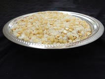 Karnataka Style Ellu Bella Makara Sankranti Festival Distribution or Eating Food Mix isolated on white background