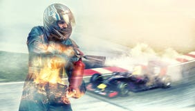 Kart croisant la ligne d'arrivée coureur, le feu photographie stock libre de droits Kart croisant la ligne d'arrivée coureur, le feu photographie stock libre de droits