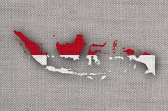 Karte und Flagge von Indonesien auf altem Leinen stockbild Karte und Flagge von Indonesien auf altem Leinen stockbild
