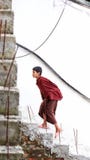 Buddhist monk climbing stairs royalty free stock image Buddhist monk climbing stairs royalty free stock image
