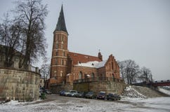 Kaunas, Lithuania - January 3, 2016: Brick Church of the Assumption of The Holy Virgin Mary in the bank of rever Neman royalty free stock images Kaunas, Lithuania - January 3, 2016: Brick Church of the Assumption of The Holy Virgin Mary in the bank of rever Neman royalty free stock images