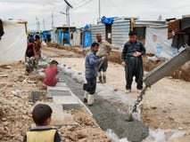 05.2017, Kawergosk, Iraq.: Refugees constructing infrastructure in norther Iraq