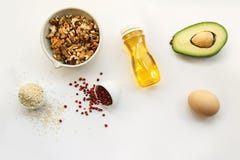 Keto dieting. ketogenic foods on white background with copy space. low carb, high good fat. Concept diet for health and weight los royalty free stock images Keto dieting. ketogenic foods on white background with copy space. low carb, high good fat. Concept diet for health and weight los royalty free stock images