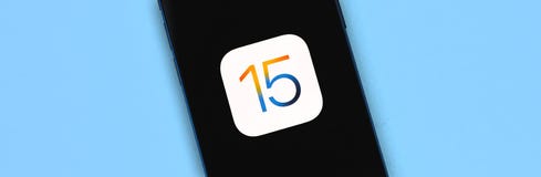 Kharkov, Ukraine - June 18, 2021: Apple software updates banner, iOS 15 logo icon on the screen