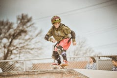 Kid Skateboarding Stock Images