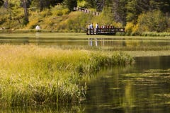 Kids And Teachers At Lake In Autumn. Stock Photo
