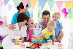 Kids birthday party. Family celebration with cake. Royalty Free Stock Photography Kids birthday party. Family celebration with cake. Royalty Free Stock Photography