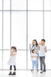 Kids bullying to friend stock photos Kids bullying to friend stock photos