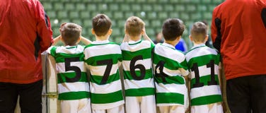 Kids Futsal Indoor Soccer Team Standing Together with Teacher stock photos Kids Futsal Indoor Soccer Team Standing Together with Teacher stock photos