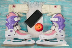 Kids ice skates with adjustable size and accessories on the wooden floor. royalty free stock photos Kids ice skates with adjustable size and accessories on the wooden floor. royalty free stock photos