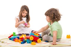 Kids Playing With Bricks Toys Stock Image