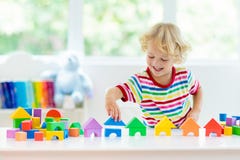 Kids toys. Child building tower of toy blocks stock images Kids toys. Child building tower of toy blocks stock images