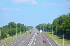 Kiev-Chop highway in the afternoon with cars, view into the dist stock photos Kiev-Chop highway in the afternoon with cars, view into the dist stock photos