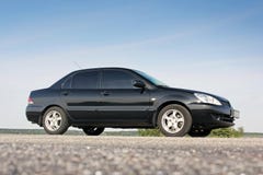 Kiev, Ukraine. August 29, 2017. Mitsubishi Lancer on the track. Side view stock photography Kiev, Ukraine. August 29, 2017. Mitsubishi Lancer on the track. Side view stock photography