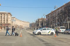 Kiev,Ukraine - May 06, 2017:Central street of ukrainian capital Kyiv Khreschatyk closed for traffic by police car and stock photo Kiev,Ukraine - May 06, 2017:Central street of ukrainian capital Kyiv Khreschatyk closed for traffic by police car and stock photo