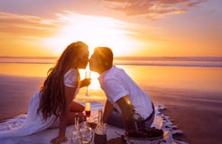 Kiss a loved one at sunset.