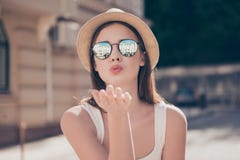 Kiss for you! Happy carefree girl on a holiday is sending an air Stock Images Kiss for you! Happy carefree girl on a holiday is sending an air Stock Images