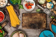 Kitchen Board With Raw Spaghetti And Ingredients For Cooking Pas Stock Image Kitchen Board With Raw Spaghetti And Ingredients For Cooking Pas Stock Image